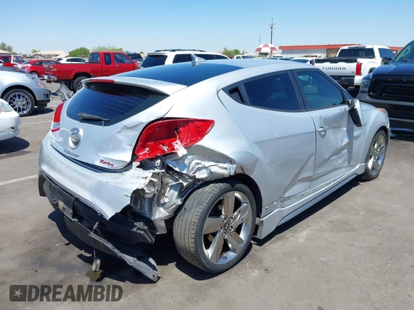 2013 Hyundai Veloster Turbo z VIN KMHTC6AE0DU177983, wystawiony jako IAAI lot #42292102 z przebiegiem 121 142 mil mil oraz . Historia ofert i sprzedaży dostępna na DreamBid. Obrazek 6.