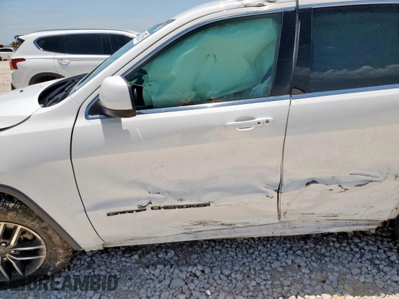 2019 Jeep Grand Cherokee Laredo E with VIN 1C4RJEAG0KC603870, listed as a Copart auction lot 60142575 with Not provided miles and Salvage title. Bid and sale history available at DreamBid. Image 7.
