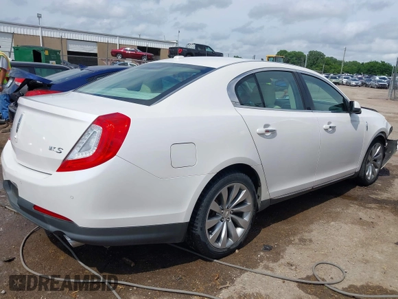 2014 Lincoln MKS z VIN 1LNHL9DK7EG601720, wystawiony jako IAAI lot #42464979 z przebiegiem 58 163 mil mil oraz . Historia ofert i sprzedaży dostępna na DreamBid. Obrazek 13.