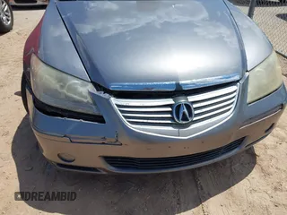 2005 Acura RL z VIN JH4KB16575C011822, wystawiony jako IAAI lot #42434095 z przebiegiem Nie podano mil oraz . Historia ofert i sprzedaży dostępna na DreamBid. Obrazek 6.