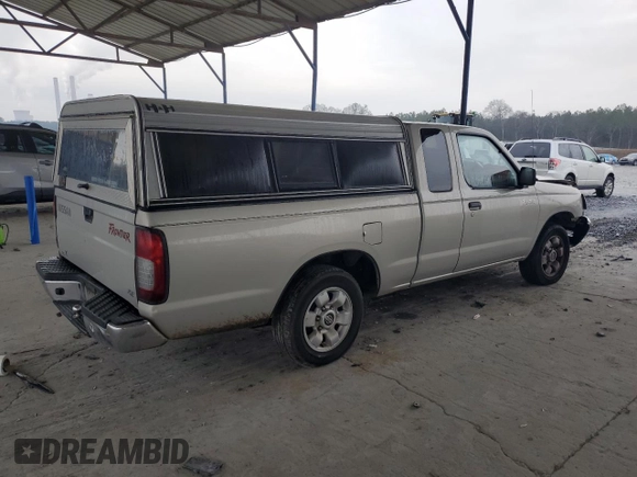 1999 Nissan Frontier XE with VIN 1N6DD26SXXC344449, listed as a Copart auction lot 43748015 with 137,318 mi miles and Salvage title. Bid and sale history available at DreamBid. Image 3.