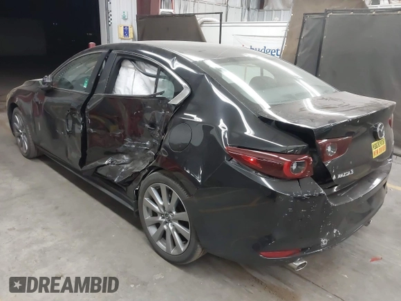 2023 Mazda 3 S Preferred with VIN 3MZBPACM5PM369790, listed as a IAAI auction lot 41612983 with 9,789 mi miles and . Bid and sale history available at DreamBid. Image 3.