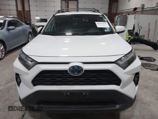 2023 Toyota RAV4 Hybrid XLE with VIN 2T3UWRFV1PW156948, listed as a IAAI auction lot 41556334 with 21,196 mi miles. Bid and sale history available at carsss.com. Image 13.