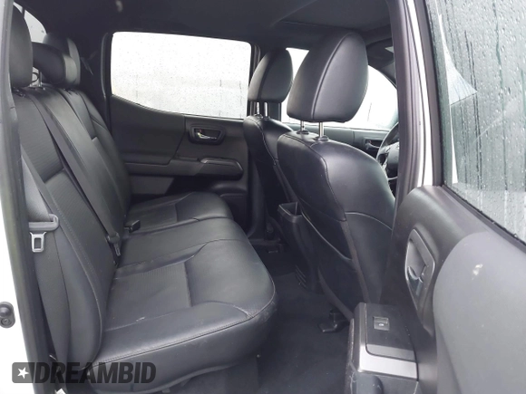 2021 Toyota Tacoma SR5 with VIN 3TMDZ5BN1MM100575, listed as a IAAI auction lot 41516274 with 61,974 mi miles and . Bid and sale history available at DreamBid. Image 8.