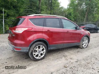 2014 Ford Escape Titanium z VIN 1FMCU0J95EUA82835, wystawiony jako Copart lot #59901675 z przebiegiem 155 193 mil mil oraz Czysty tytuł • Clean title. Historia ofert i sprzedaży dostępna na DreamBid. Obrazek 3.