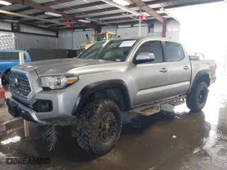 2018 Toyota Tacoma SR with VIN 5TFCZ5AN0JX132968, listed as a IAAI auction lot 41605762 with 106,233 mi miles. Bid and sale history available at carsss.com. Image 2.