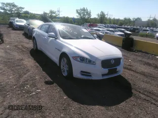 2013 Jaguar XJ Portfolio with VIN SAJWJ2GD9D8V46428, listed as a IAAI auction lot 39476908 with 121,344 mi miles and . Bid and sale history available at DreamBid. Image 1.