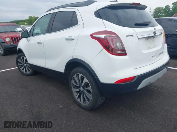 2019 Buick Encore Essence with VIN KL4CJGSM2KB876329, listed as a IAAI auction lot 42101397 with 84,020 mi miles. Bid and sale history available at carsss.com. Image 3.