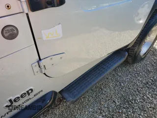 2004 Jeep Wrangler Sport with VIN 1J4FA49SX4P776775, listed as a Copart auction lot 74946824 with Not Provided miles and Salvage Title. Bid and sale history available at carsss.com. Image 12.