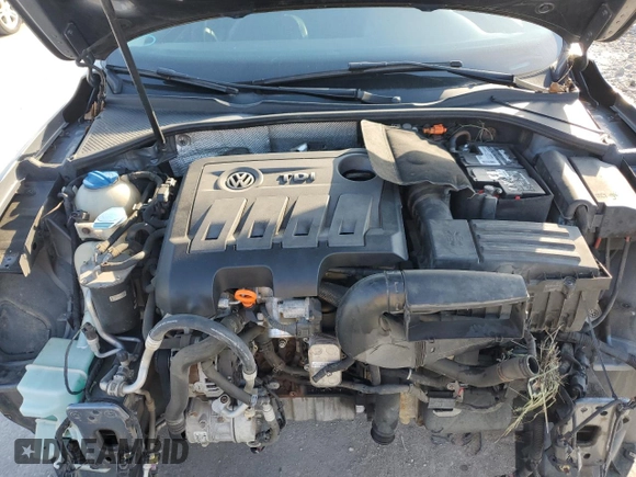2013 Volkswagen Passat SEL Premium z VIN 1VWCN7A36DC135095, wystawiony jako Copart lot #57338905 z przebiegiem 151 843 mil mil oraz Szkoda całkowita • Salvage title. Historia ofert i sprzedaży dostępna na DreamBid. Obrazek 11.