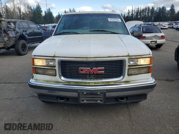 1997 GMC Yukon with VIN 1GKEK13R5VJ762200, listed as a Copart auction lot 47579745 with 165,573 mi miles and Clean Title. Bid and sale history available at carsss.com. Image 5.