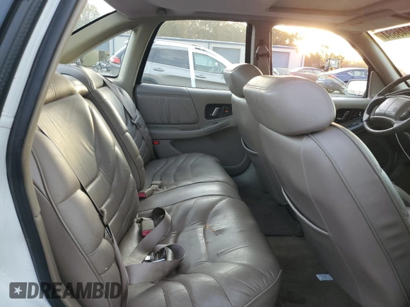1996 Buick Regal with VIN 2G4WF52KXT1512650, listed as a Copart auction lot 79048884 with 225,558 mi miles and Salvage Title. Bid and sale history available at DreamBid. Image 10.