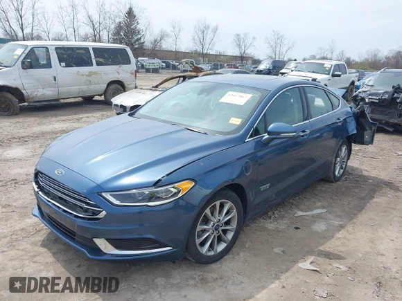 2018 Ford Fusion Energi SE with VIN 3FA6P0PU0JR196091, listed as a IAAI auction lot 42017867 with 70,284 mi miles. Bid and sale history available at carsss.com. Image 17.