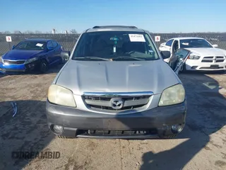 2003 Mazda Tribute LX with VIN 4F2YZ04183KM44733, listed as a IAAI auction lot 41472662 with 246,522 mi miles and . Bid and sale history available at DreamBid. Image 12.