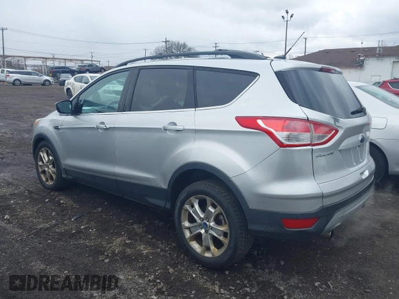 2013 Ford Escape SE with VIN 1FMCU0GX5DUA51847, listed as a IAAI auction lot 41897727 with 115,721 mi miles and . Bid and sale history available at DreamBid. Image 3.