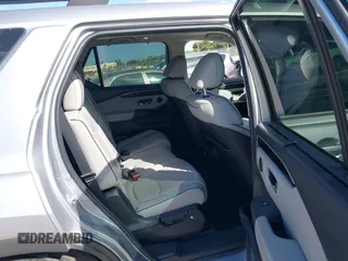 2023 Honda Pilot Elite with VIN 5FNYG1H83PB018826, listed as a IAAI auction lot 41301261 with 23,252 mi miles. Bid and sale history available at carsss.com. Image 8.