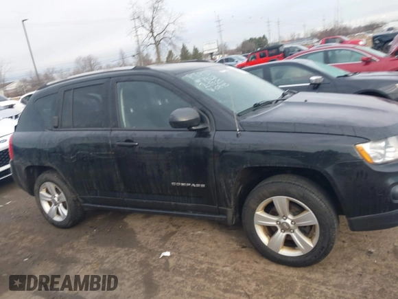 2012 Jeep Compass Sport with VIN 1C4NJCBA6CD660843, listed as a IAAI auction lot 41679095 with 173,950 mi miles. Bid and sale history available at carsss.com. Image 13.