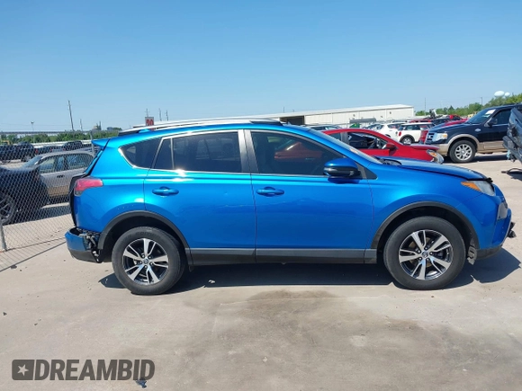 2018 Toyota RAV4 XLE with VIN JTMWFREV2JJ168557, listed as a IAAI auction lot 41994837 with 107,636 mi miles. Bid and sale history available at carsss.com. Image 13.