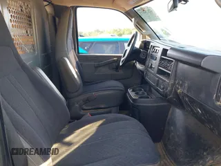 2018 Chevrolet Express Cargo with VIN 1GCWGAFG7J1906173, listed as a IAAI auction lot 42176671 with 189,951 mi miles and . Bid and sale history available at DreamBid. Image 5.