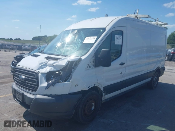 2015 Ford Transit Cargo z VIN 1FTNR2CG1FKB04641, wystawiony jako IAAI lot #42642710 z przebiegiem 136 892 mil mil oraz . Historia ofert i sprzedaży dostępna na DreamBid. Obrazek 2.