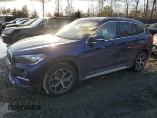 2018 BMW X1 xDrive28i with VIN WBXHT3C32J3H31391, listed as a Copart auction lot 88584855 with 32,441 mi miles and Salvage Title. Bid and sale history available at DreamBid. Image 1.