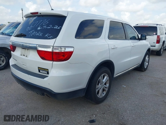 2013 Dodge Durango SXT with VIN 1C4RDHAG4DC667776, listed as a IAAI auction lot 42656299 with 204,181 mi miles and . Bid and sale history available at DreamBid. Image 4.