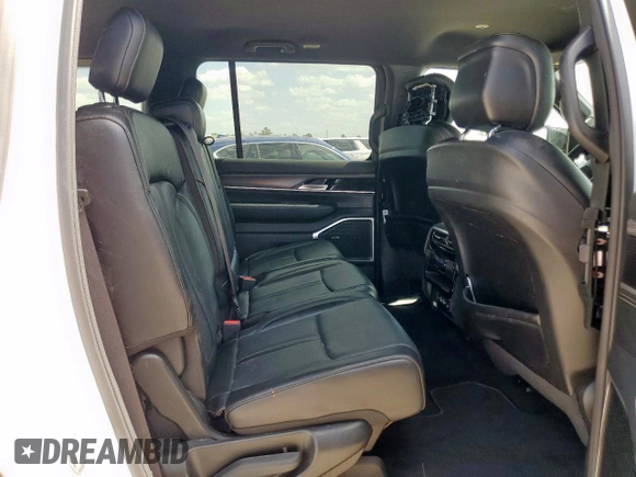 2024 Jeep Wagoneer Series II with VIN 1C4SJUBP1RS120186, listed as a Copart auction lot 65984345 with 56,748 mi miles and Clean title. Bid and sale history available at DreamBid. Image 11.