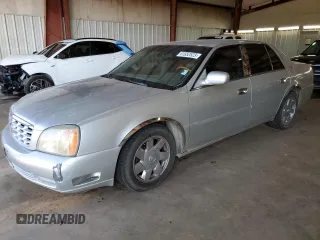 2002 Cadillac DeVille DTS with VIN 1G6KF57952U303332, listed as a Copart auction lot 61852523 with 173,500 mi miles and Clean Title. Bid and sale history available at carsss.com. Image 1.