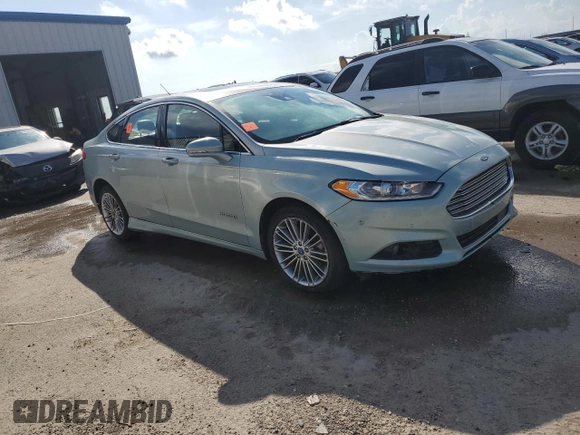 2013 Ford Fusion SE Hybrid with VIN 3FA6P0LUXDR375782, listed as a Copart auction lot 61994215 with Not provided miles and Non repairable. Bid and sale history available at DreamBid. Image 4.