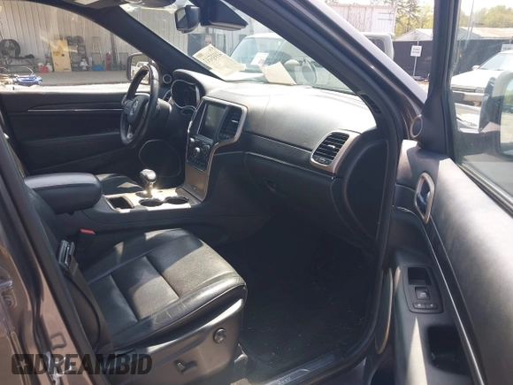 2014 Jeep Grand Cherokee Summit с VIN 1C4RJEJGXEC299600, выставлен на аукционе IAAI как лот 41935193 с пробегом 199 831 миль миль и . История ставок и продаж доступна на DreamBid. Изображение 5.