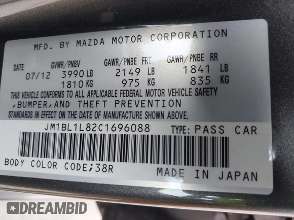 2012 Mazda Mazda3 i Touring with VIN JM1BL1L82C1696088, listed as a IAAI auction lot 41872228 with 111,629 mi miles. Bid and sale history available at carsss.com. Image 9.