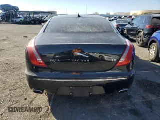 2014 Jaguar XJ with VIN SAJWA2GZXE8V59542, listed as a Copart auction lot 73672614 with 105,328 mi miles and Salvage Title. Bid and sale history available at carsss.com. Image 6.