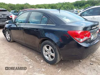 2014 Chevrolet Cruze 1LT with VIN 1G1PC5SB5E7433631, listed as a IAAI auction lot 42518491 with 99,962 mi miles and . Bid and sale history available at DreamBid. Image 3.
