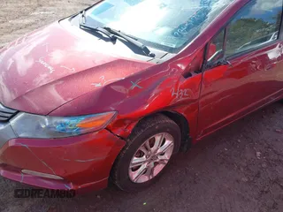 2010 Honda Insight EX with VIN JHMZE2H78AS032088, listed as a IAAI auction lot 41694387 with 145,776 mi miles and . Bid and sale history available at DreamBid. Image 6.