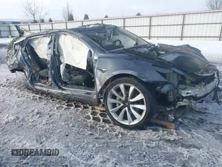 2020 Tesla Model 3 Long Range z VIN 5YJ3E1EB9LF787390, wystawiony jako IAAI lot #41614394 z przebiegiem Nie podano mil oraz . Historia ofert i sprzedaży dostępna na DreamBid. Obrazek 1.