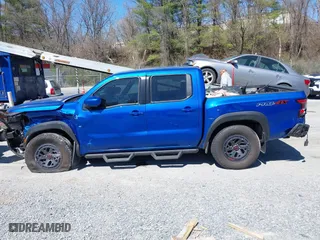 2025 Nissan Frontier PRO-4X with VIN 1N6ED1EK0SN614348, listed as a IAAI auction lot 41826627 with 6,931 mi miles. Bid and sale history available at carsss.com. Image 14.
