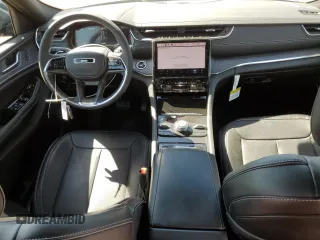 2023 Jeep Grand Cherokee Overland z VIN 1C4RJHDG4PC516719, wystawiony jako Copart lot #73334034 z przebiegiem 6 306 mil mil oraz Szkoda całkowita • Salvage title. Historia ofert i sprzedaży dostępna na DreamBid. Obrazek 8.