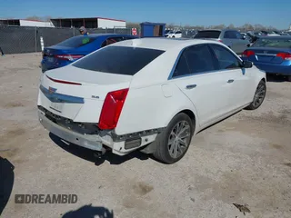 2016 Cadillac CTS with VIN 1G6AR5SS1G0112728, listed as a IAAI auction lot 41830547 with 100,610 mi miles and . Bid and sale history available at DreamBid. Image 4.