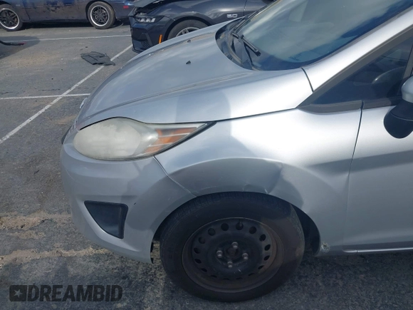 2012 Ford Fiesta SE with VIN 3FADP4BJ3CM106380, listed as a IAAI auction lot 42121786 with 81,613 mi miles. Bid and sale history available at carsss.com. Image 6.