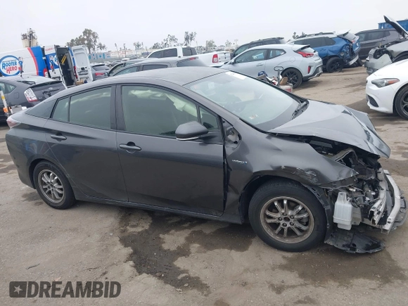 2016 Toyota Prius Two z VIN JTDKBRFU2G3508593, wystawiony jako IAAI lot #42248961 z przebiegiem 54 043 mil mil oraz . Historia ofert i sprzedaży dostępna na DreamBid. Obrazek 14.