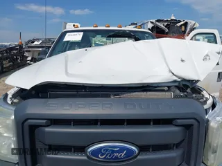 2011 Ford F-250 XL with VIN 1FT7X2AT4BEC33450, listed as a IAAI auction lot 39410571 with Not provided miles and . Bid and sale history available at DreamBid. Image 10.
