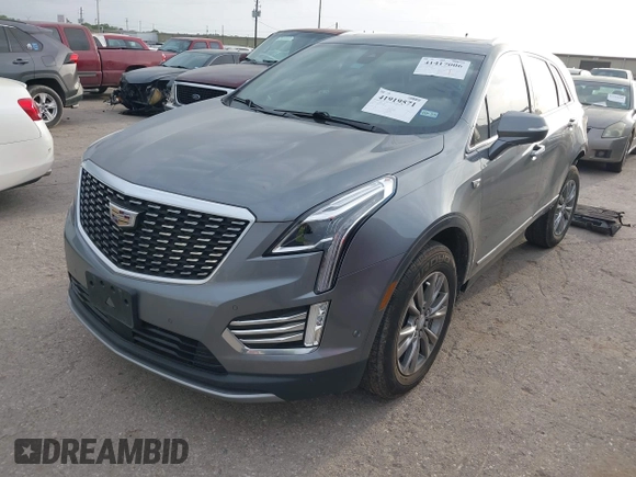 2021 Cadillac XT5 FWD Premium Luxury with VIN 1GYKNCRS5MZ128908, listed as a IAAI auction lot 41919571 with 51,280 mi miles and . Bid and sale history available at carsss.com. Image 18.