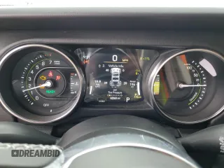 2023 Jeep Wrangler Sahara with VIN 1C4JJXP63PW536694, listed as a Copart auction lot 63409845 with 32,560 mi miles and Salvage title. Bid and sale history available at DreamBid. Image 9.