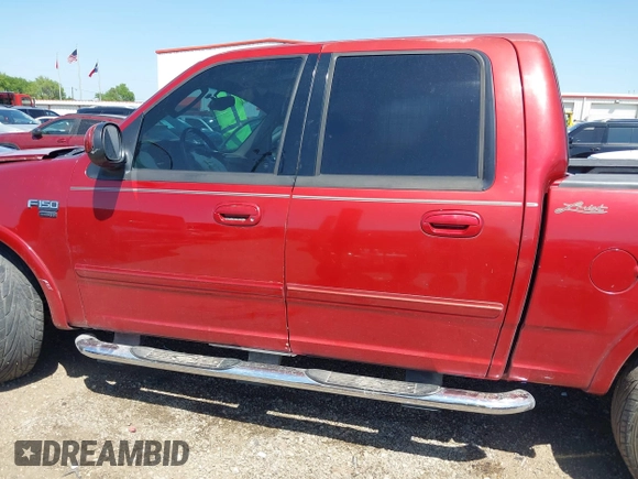 2002 Ford F-150 XLT with VIN 1FTRW07682KC33857, listed as a IAAI auction lot 41870137 with 185,480 mi miles. Bid and sale history available at carsss.com. Image 15.