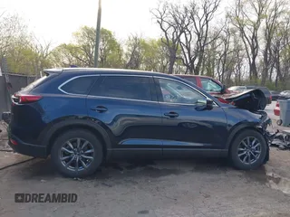 2021 Mazda CX-9 Touring с VIN JM3TCBCY4M0522399, выставлен на аукционе IAAI как лот 41978128 с пробегом 71 821 миль миль и . История ставок и продаж доступна на DreamBid. Изображение 14.
