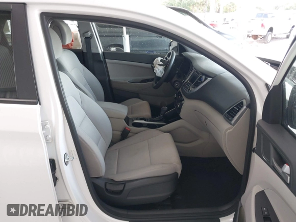 2018 Hyundai Tucson SE z VIN KM8J2CA44JU657178, wystawiony jako IAAI lot #42157871 z przebiegiem 130 715 mil mil oraz . Historia ofert i sprzedaży dostępna na DreamBid. Obrazek 5.