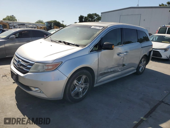 2011 Honda Odyssey Touring с VIN 5FNRL5H92BB063040, выставлен на аукционе Copart как лот 58551765 с пробегом 236 526 миль миль и Списание • Salvage title. История ставок и продаж доступна на DreamBid. Изображение 1.
