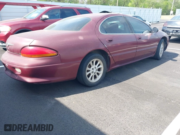 2000 Chrysler LHS with VIN 2C3HC56G1YH413455, listed as a IAAI auction lot 42038726 with 248,054 mi miles. Bid and sale history available at carsss.com. Image 4.