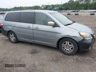 2006 Honda Odyssey EX z VIN 5FNRL38466B064187, wystawiony jako IAAI lot #42462383 z przebiegiem 313 097 mil mil oraz . Historia ofert i sprzedaży dostępna na DreamBid. Obrazek 1.