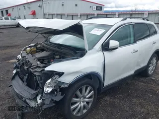 2010 Mazda CX-9 Touring with VIN JM3TB3MV1A0230587, listed as a IAAI auction lot 42152793 with 122,426 mi miles and . Bid and sale history available at carsss.com. Image 6.